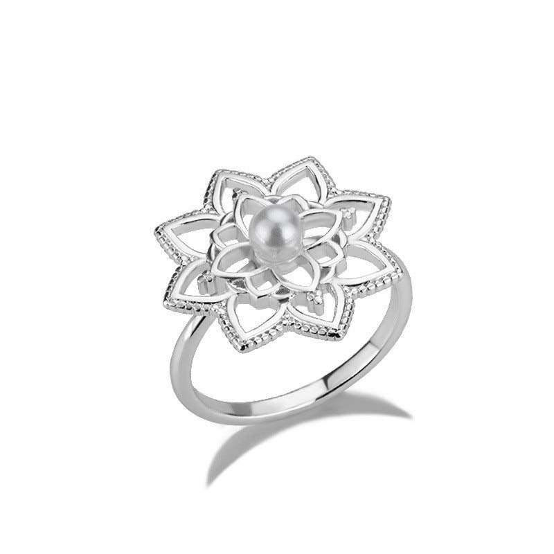 Stainless steel vintage lotus ring with opal design.