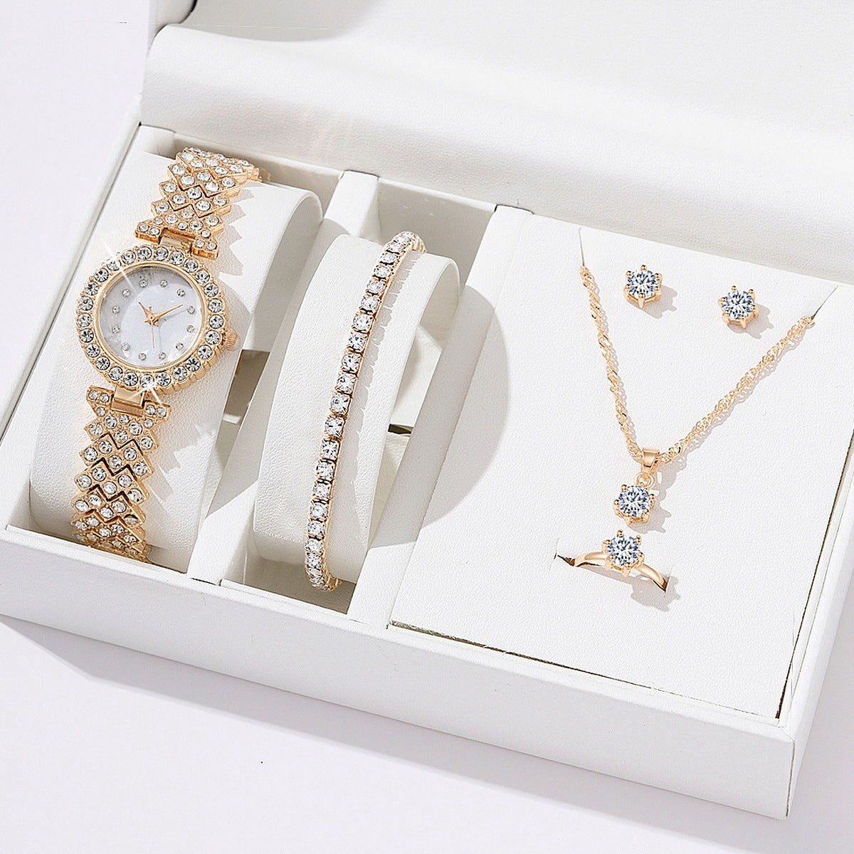 Diamond women’s luxury watch set with rhinestone bracelet, necklace, and earrings in gold finish.