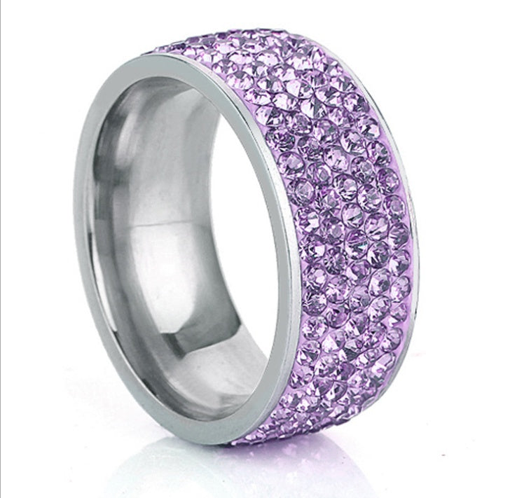 Stainless steel ring with purple gemstone rows.