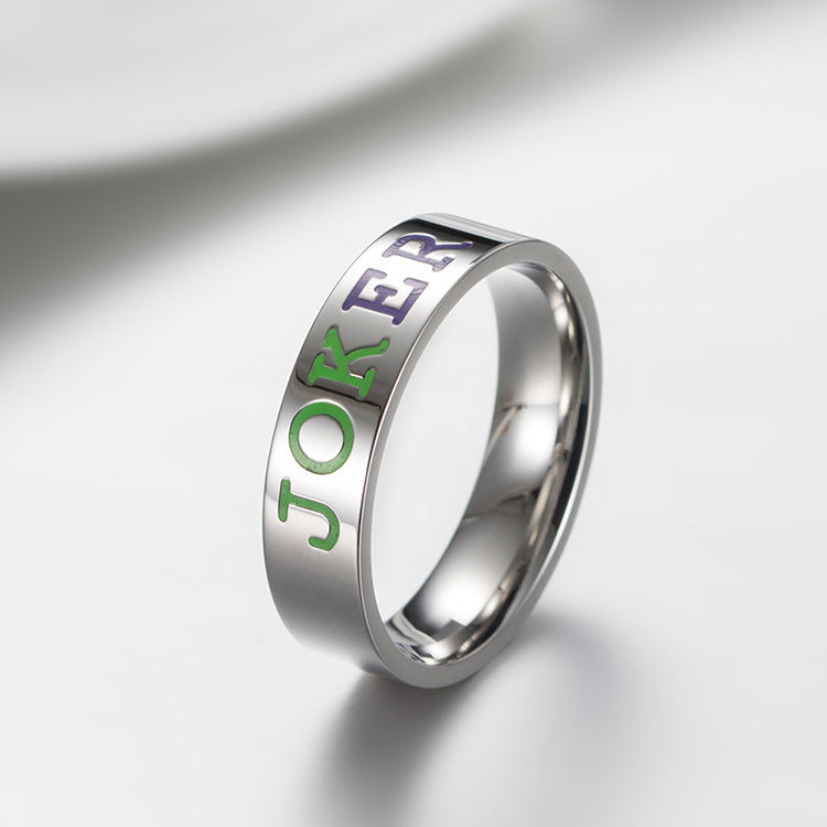 Stainless steel Joker ring for couples with colorful lettering design.