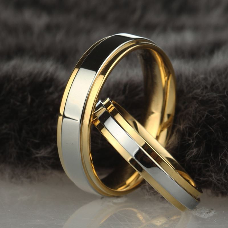 Gold couple rings made of alloy with geometric design, available in sizes 6 to 13.