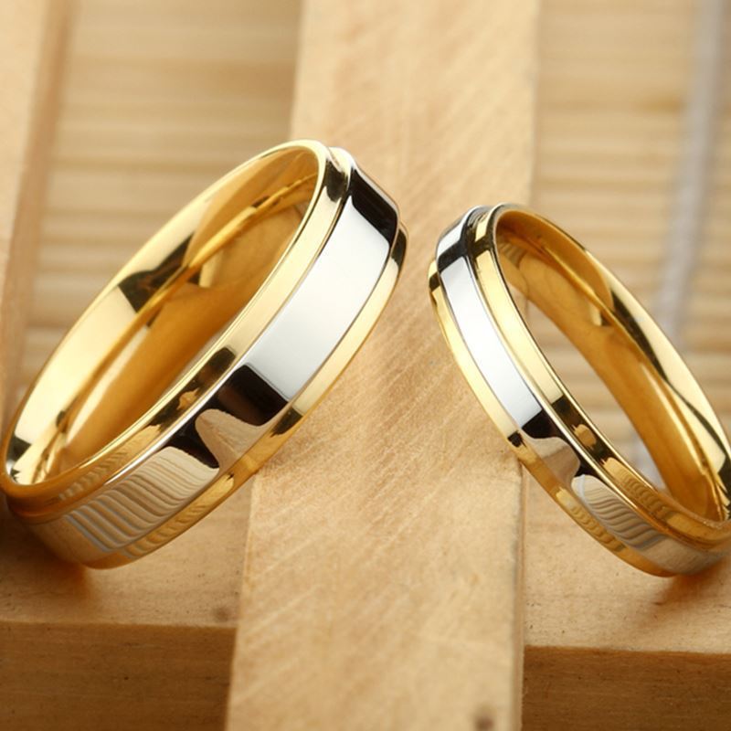 Gold couple rings made of alloy, available in geometric design with sizes 6 to 13.