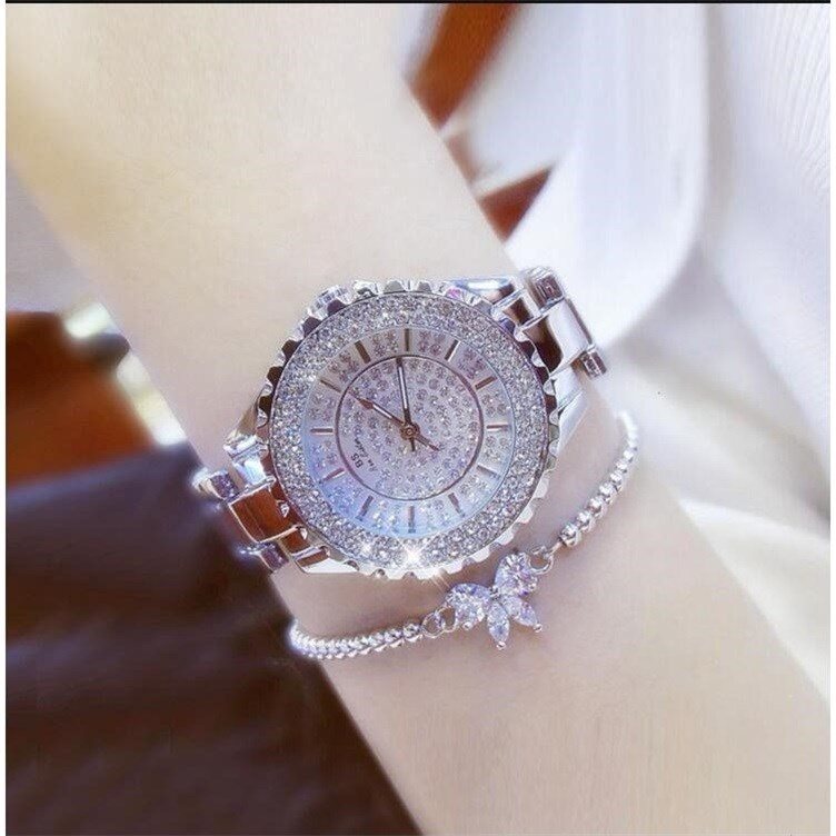 Ladies automatic mechanical watch with white ceramic strap and bracelet.