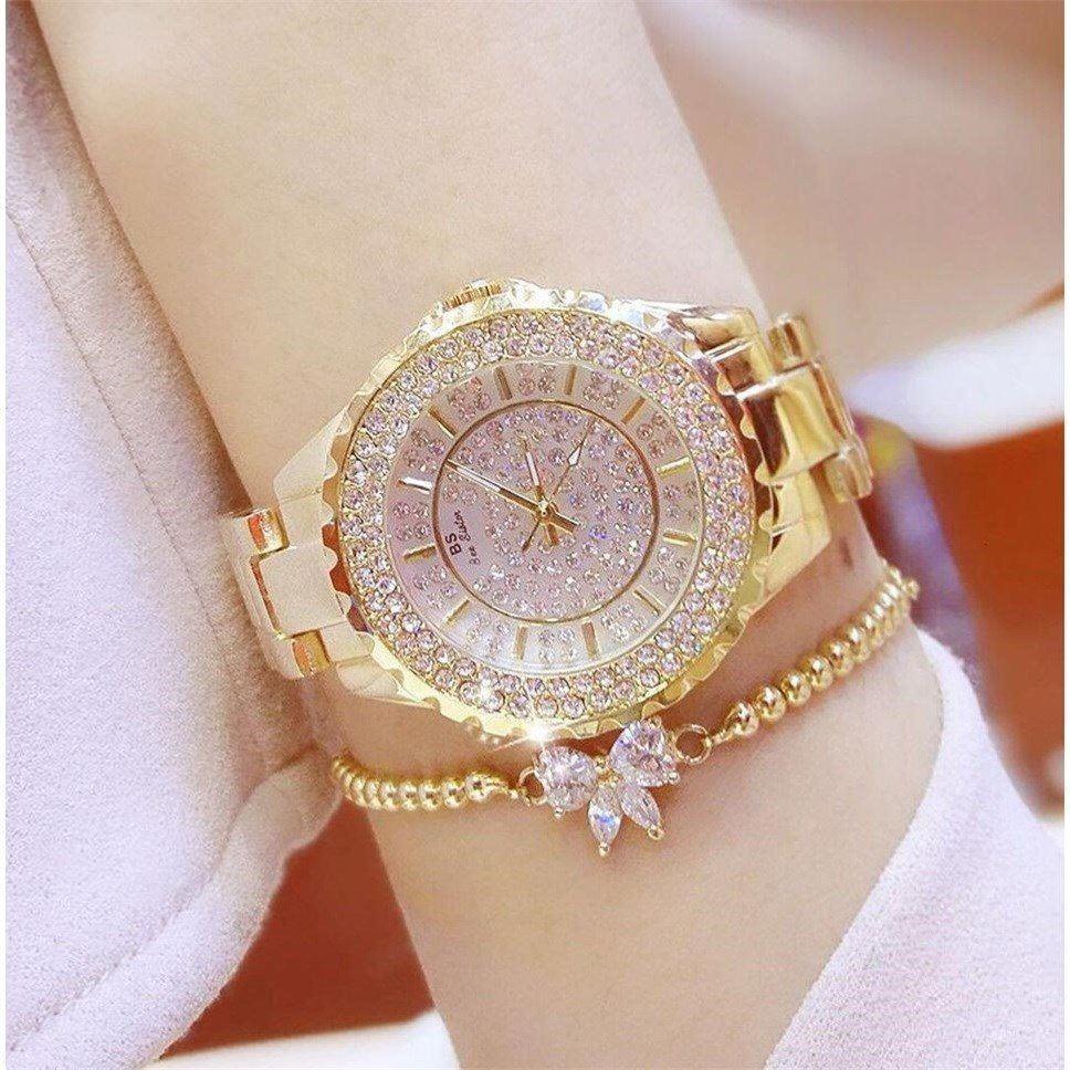 Gold gypsophila mechanical ladies watch with bow bracelet.