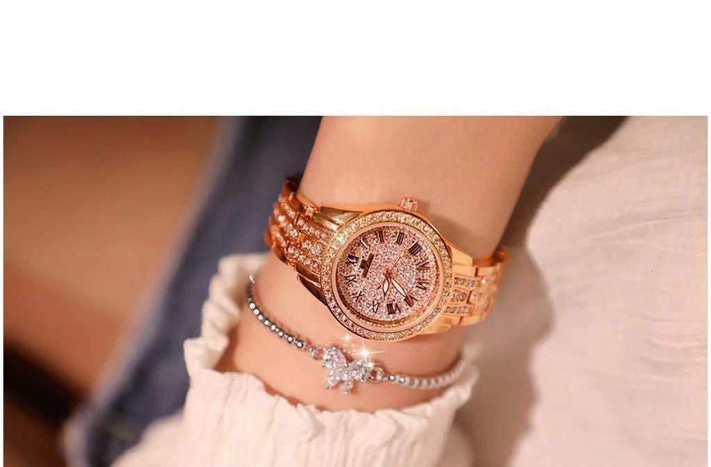 Elegant mechanical ladies watch with rose gold bracelet and diamond accents.