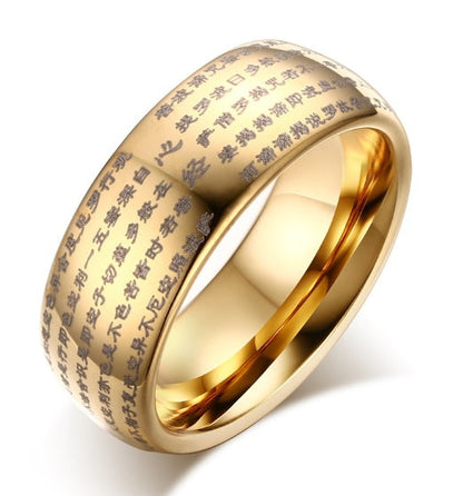 Dome ring in gold tungsten carbide with engraved design.