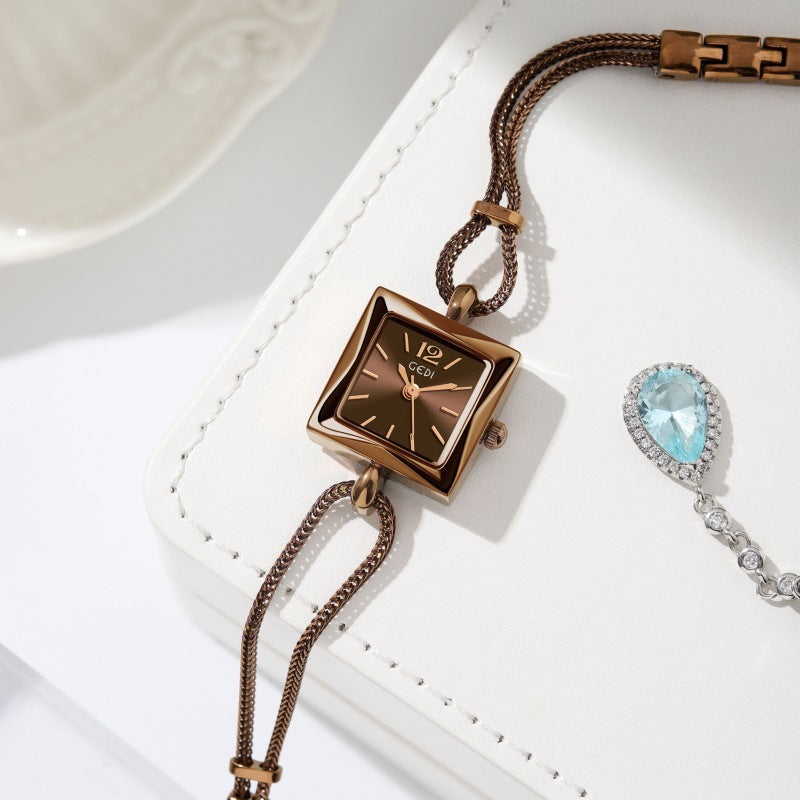 High-grade antique style small square plate alloy bracelet watch in rose gold.