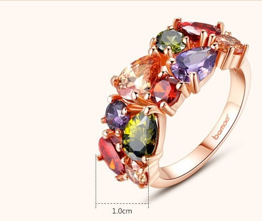 Colorful zircon ring with copper electroplating, featuring multi-colored stones and 1.0cm thickness.