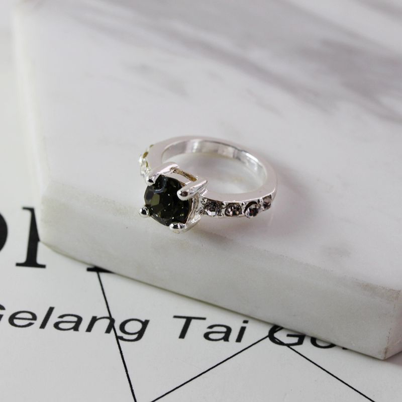 Elegant alloy fashion ring for women. Fashionable wild female rings made of alloy with gemstone details