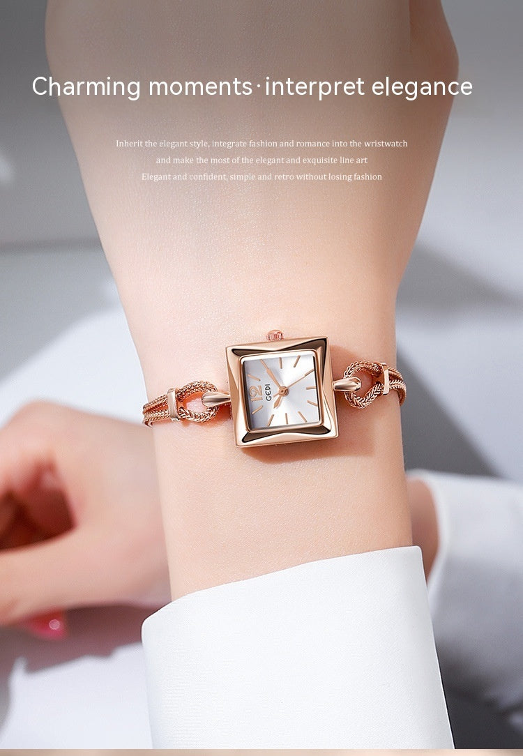 Antique style square plate alloy bracelet watch on wrist, elegant rose gold design.