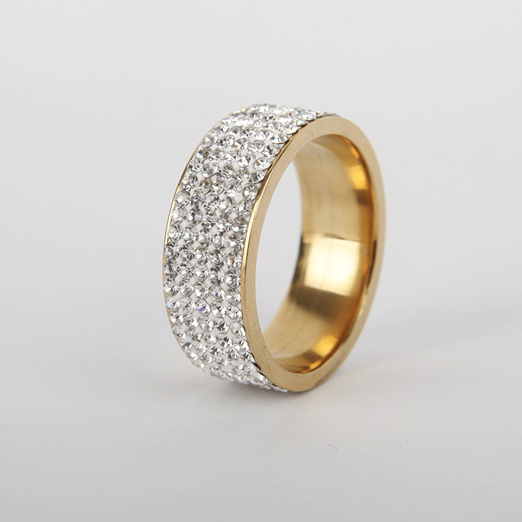 Fashion diamond ring in gold titanium steel with wave design.