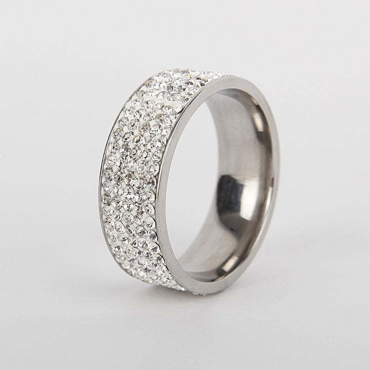 Fashion diamond ring in titanium steel with wave design, unisex style.