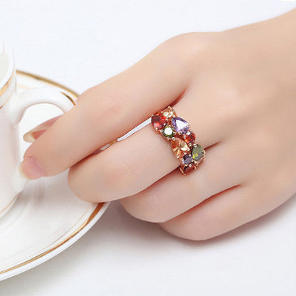 Colorful zircon rings on hand, copper electroplated with 18k gold.