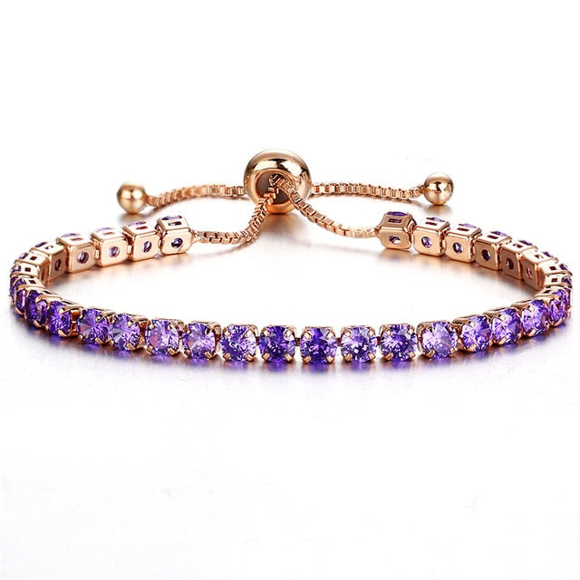 Cubic zirconia tennis bracelet and bangle with purple stones.