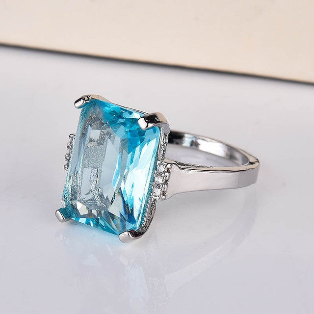 Kuololit Paraiba gemstone ring for women, showcasing an exquisite blue stone set in a polished silver band.