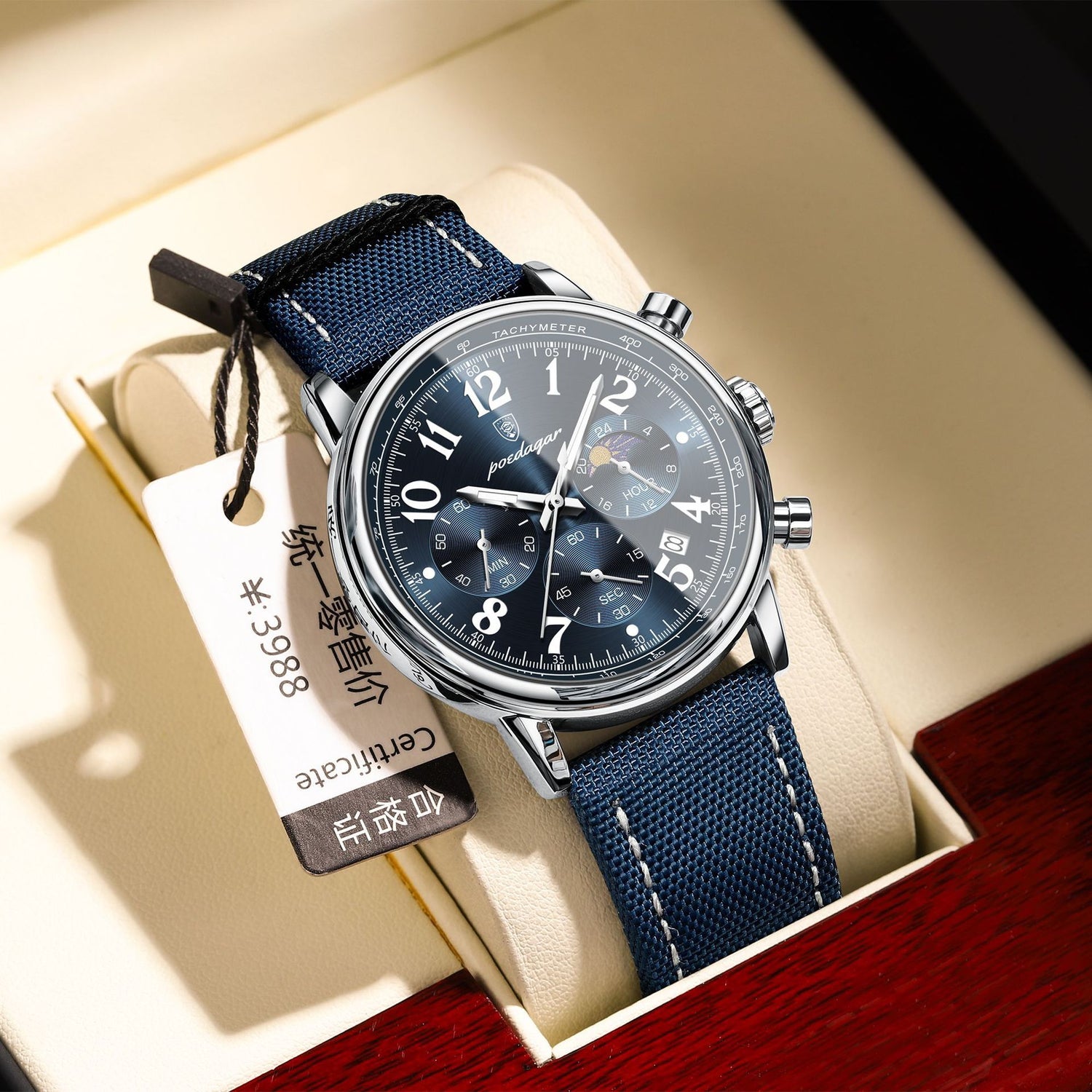 Fashion Quartz Watch with silver case and blue surface, featuring a blue ribbon strap, displayed in packaging.