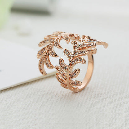 Mimosa leaves rings with intricate alloy design, adjustable size.