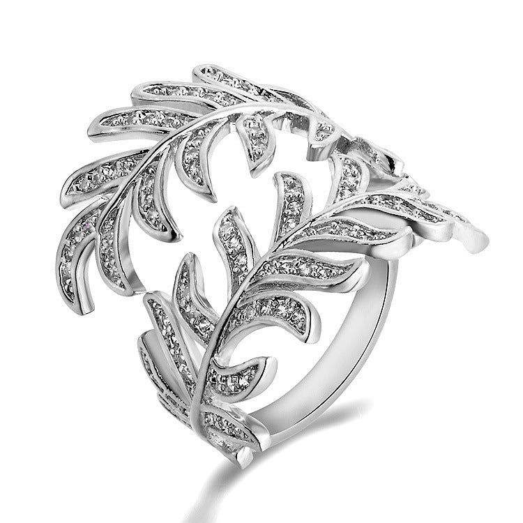 Mimosa leaves rings crafted from alloy with intricate leaf detail, adjustable size.