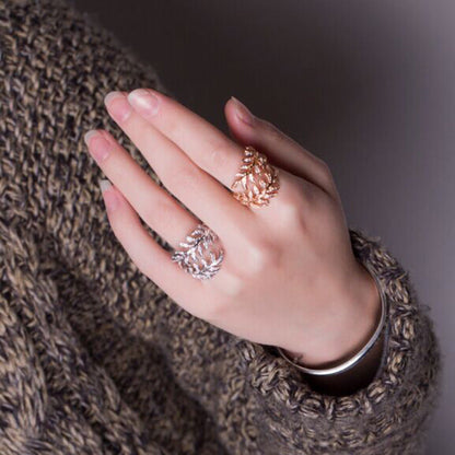 Mimosa leaves rings in silver and gold, adjustable size, capturing intricate leaf details.