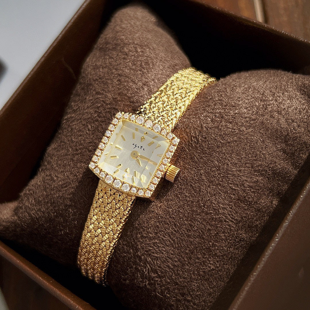 Zhonggu Small Golden Watch with square face and full gold mesh belt for ladies.