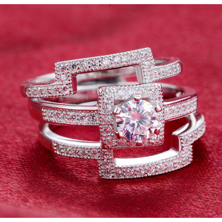 Elegant nickel-free platinum rings with intricate design, focus on wearing rings.