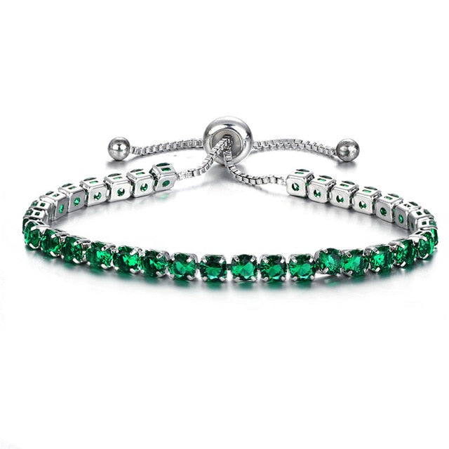 cubic zirconia tennis bracelet with green stones and adjustable clasp