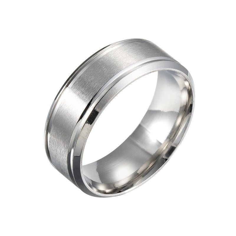 Mens wedding ring in black, silver, and gold, 8MM wide, stainless steel, geometric design.