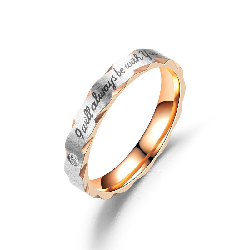 Stainless steel U-shaped couple ring with engraved phrase and diamond detail.