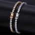 Gold and silver brass tennis bracelets with AAA CZ stones in 3mm to 5mm sizes.