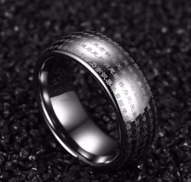 Tungsten carbide silver dome ring with engraved designs for men and women.