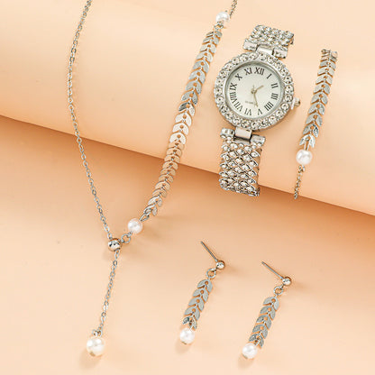 Luxury diamond women watch with matching rhinestone bracelet, necklace, and earrings set.