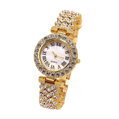 Luxury diamond women watch with rhinestone bracelet, stylish fashion quartz timepiece.