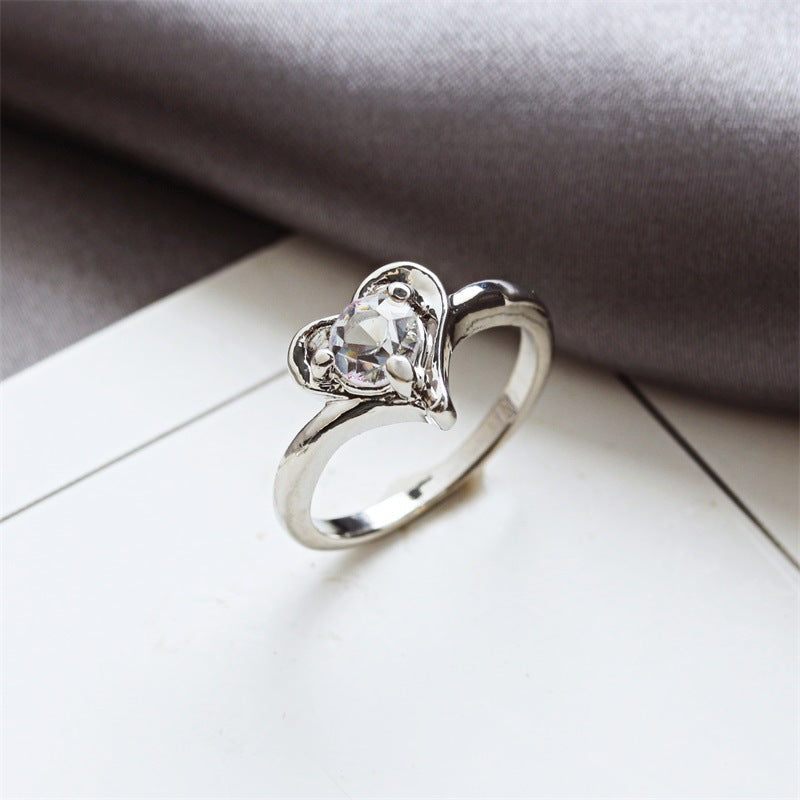 Alloy couple ring with rhinestone and star shape design.