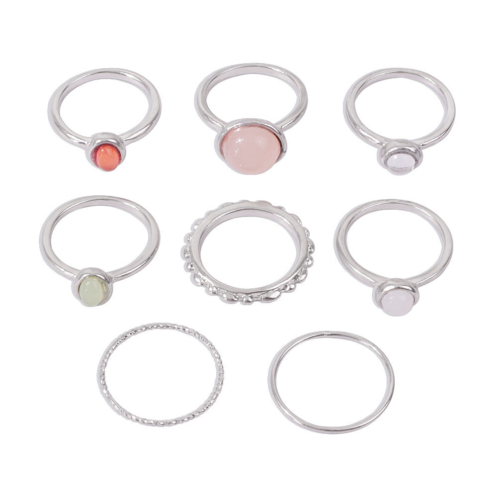 Colorful stone metallic finger rings set for women with geometric designs, alloy and resin material.