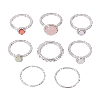 Colorful stone metallic finger rings set for women with geometric designs, alloy and resin material.