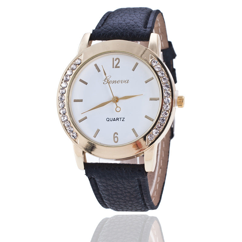 Geneva Diamond Quartz Watch Women with blue imitation leather strap and alloy case.