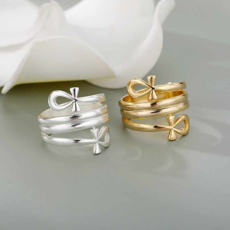 Indian double layered couple rings in gold and silver on display.