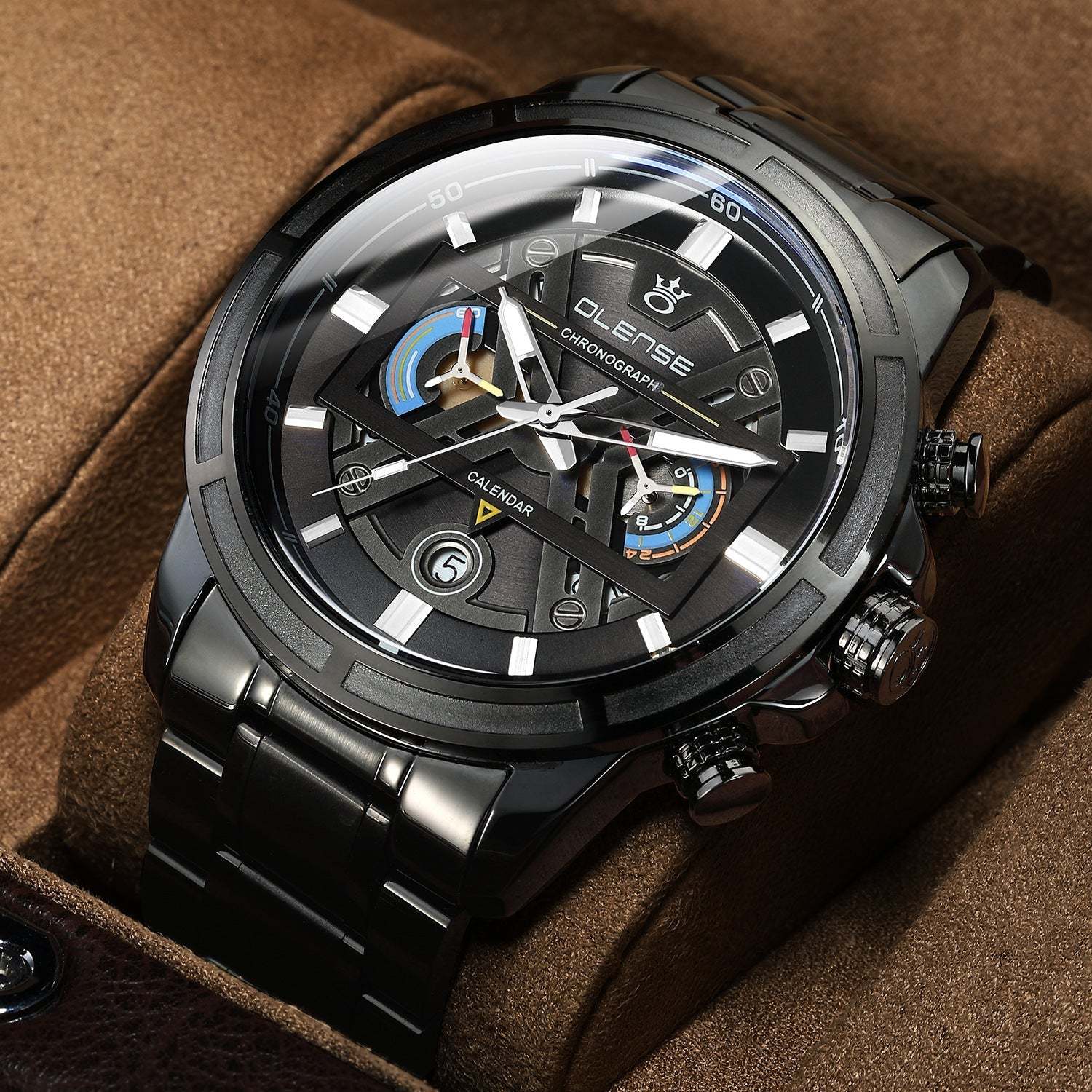 Olense calendar watch with black alloy case and stainless steel strap.