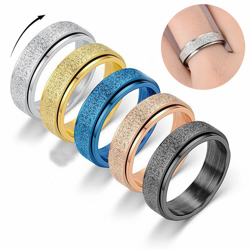 Rainbow bead fidget ring in multiple colors, titanium steel, stress relief accessory.