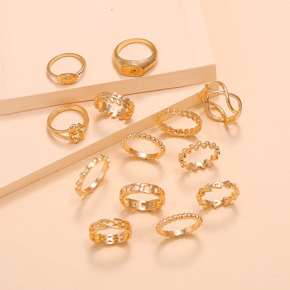 Leaf crown geometric articulation rings, 6-piece gold alloy set.