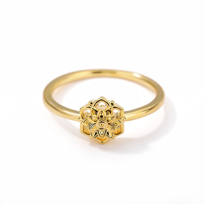 Stainless steel golden lotus ring with vintage design.